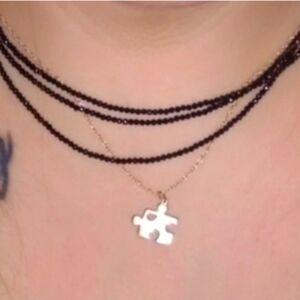 10k gold puzzle piece necklace